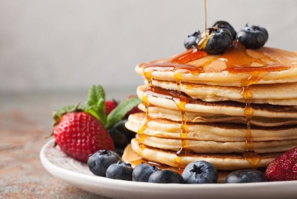 pancakes with berries and syrup