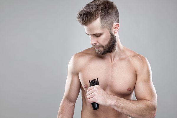 man shaving with trimmer