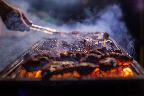barbecue meat on a grill