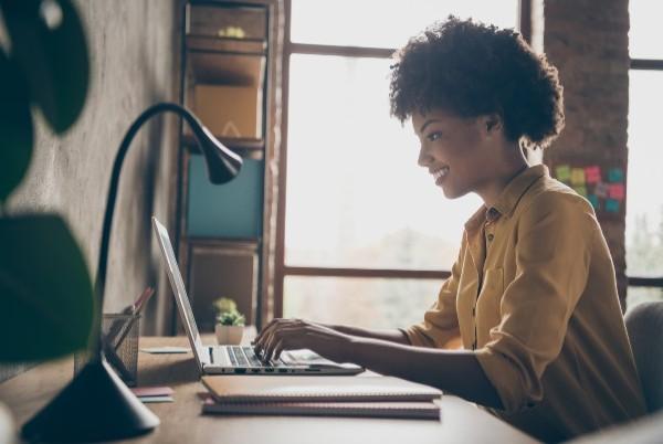 woman working on a laptop at home