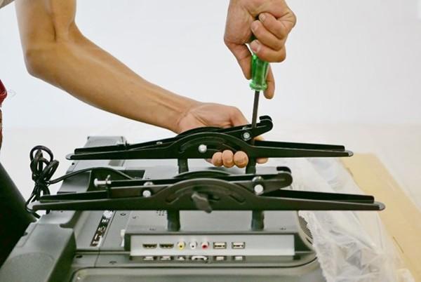 attaching tv mount bracket
