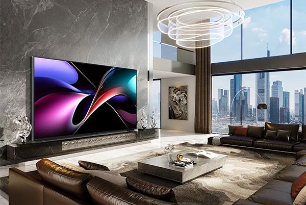 a living room with a large hisense 116ux trichroma mini led tv
