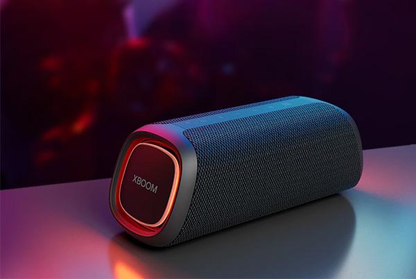 an lg xboom go xg7 portable bluetooth speaker with a glowing light on it