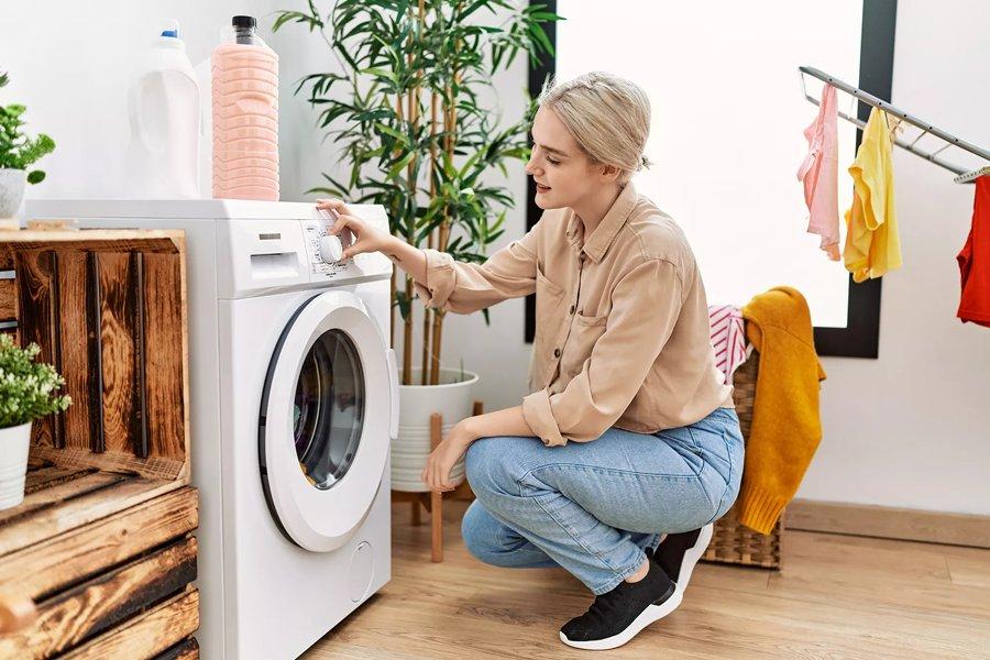 Women with washing machine