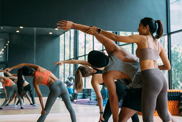 Woman exercise instructor class stretches
