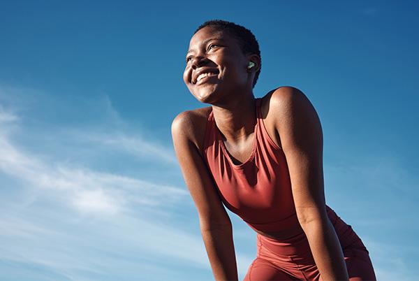 Woman fitness clothes outside sun