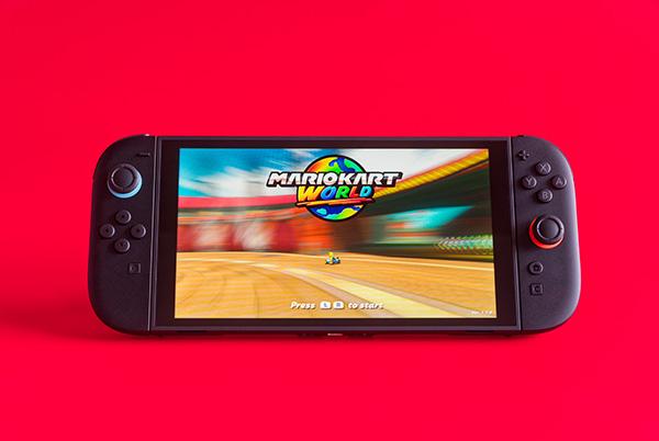 nintendo switch 2 console with mario kart world on the screen