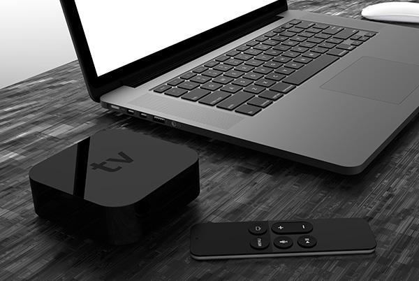 Apple TV box remote MacBook desk