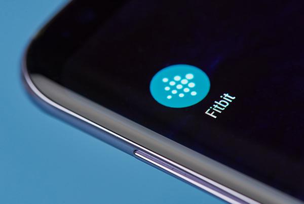 Fitbit app icon on phone tablet screen