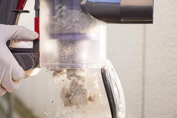 Dyson vacuum cleaner bin emptying
