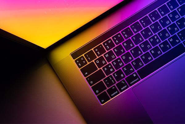 MacBook keyboard glowing screen