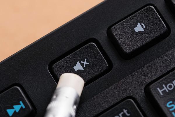 Speaker mute key on computer keyboard