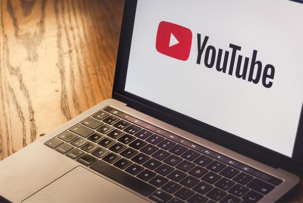YouTube logo laptop screen