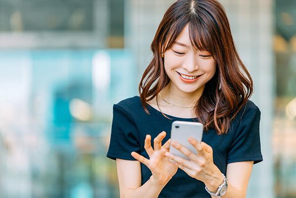 Woman smiling on phone