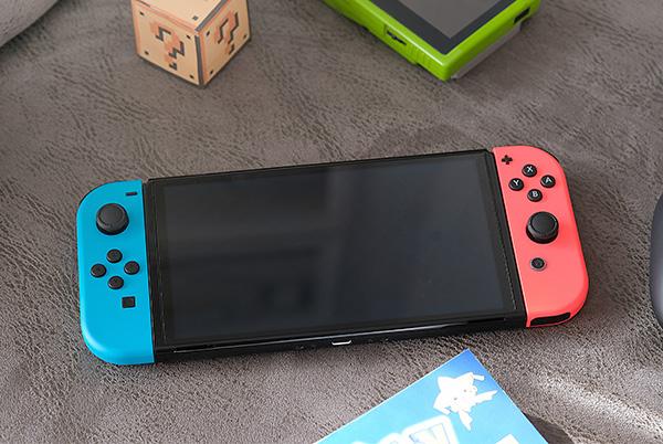 a close up of a nintendo switch on a table