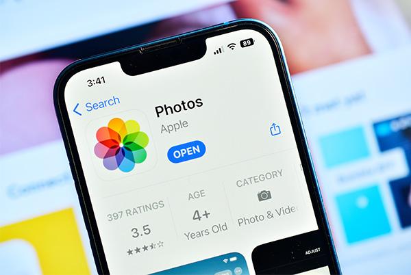 a close up of an iphone displaying the photos app