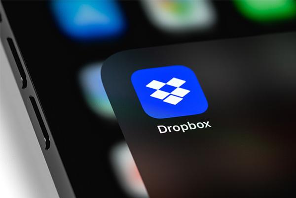 a close up of a dropbox app icon on a smartphone screen