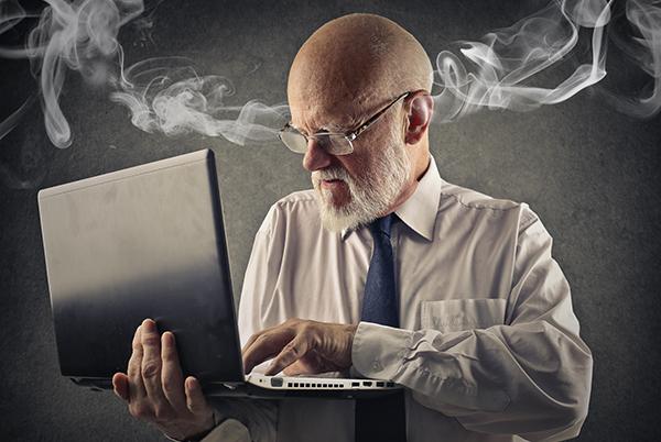 a person is using a laptop with google on it