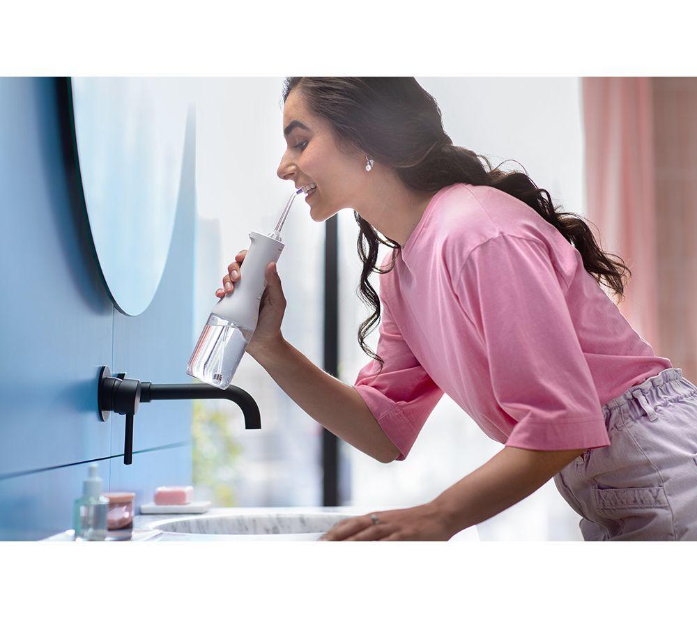 PHILIPS Sonicare 3000 Series HX3826/31 Cordless Power Flosser - White image number 4 of 6