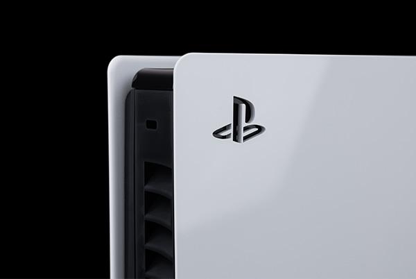 a close up of a white ps5 with a playstation logo on it