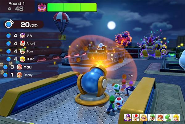 a video game still from super mario party jamboree showing canon firing at bowser character