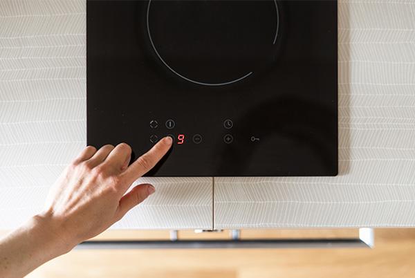 induction hob hand finger countertop