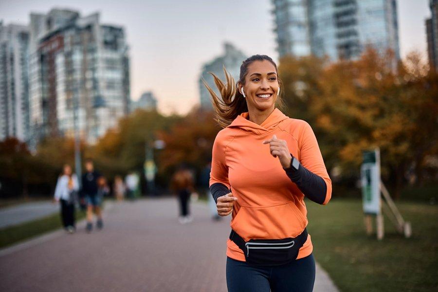 A person is running while earphones in ear