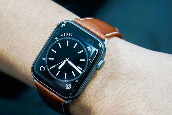 a close up of a person's wrist with an apple watch