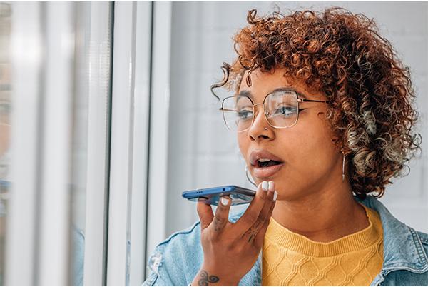 a woman speaking to her mobile phone