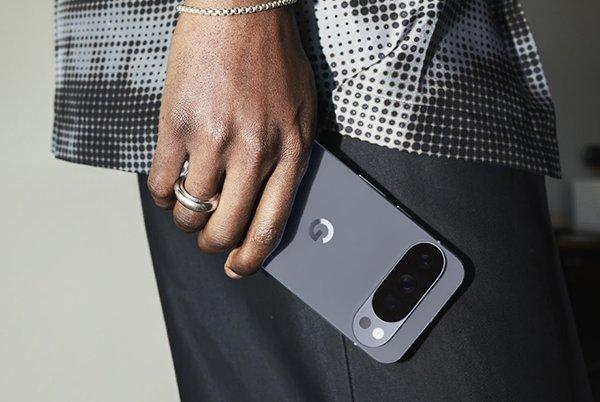 a person holding a Pixel 10
