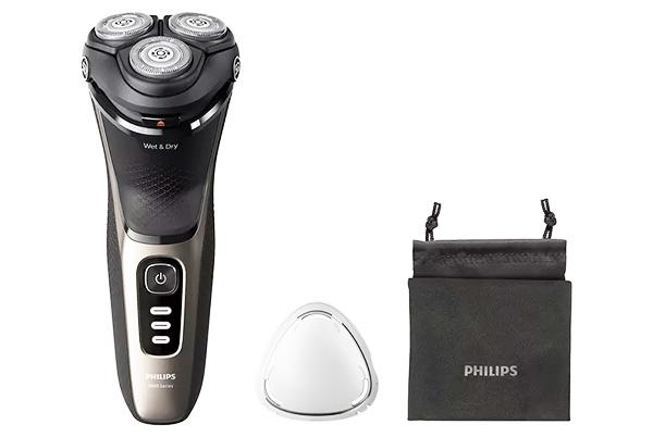 a close up of a philips shaver with accessories and a bag