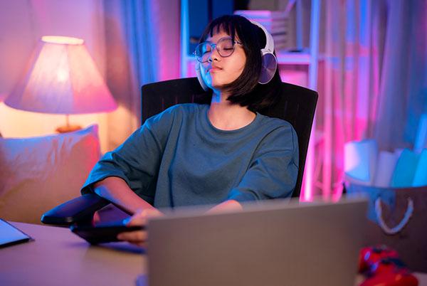 a woman relaxing with atmospheric lighting