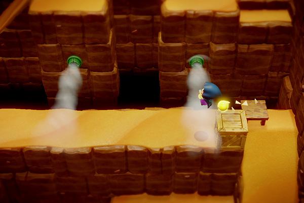 screenshot from legend of zelda echoes of wisdom game showing princess zelda jumping over an obstacle in a rocky valley