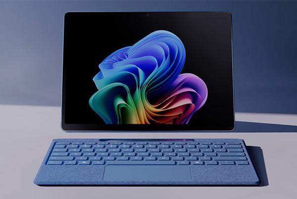 microsoft surface pro 2 in 1 laptop with a blue keyboard