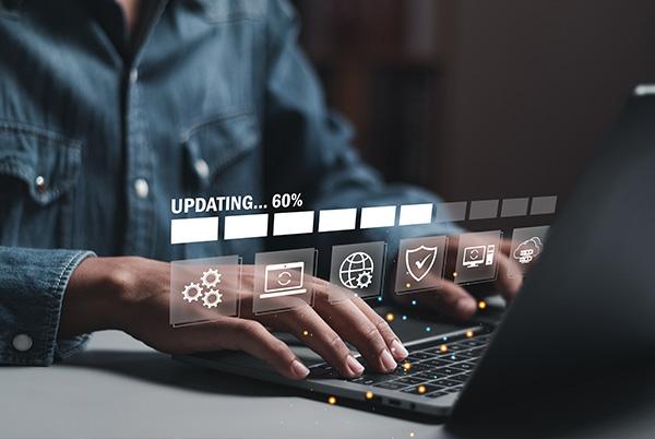 Laptop updating graphic bar hands