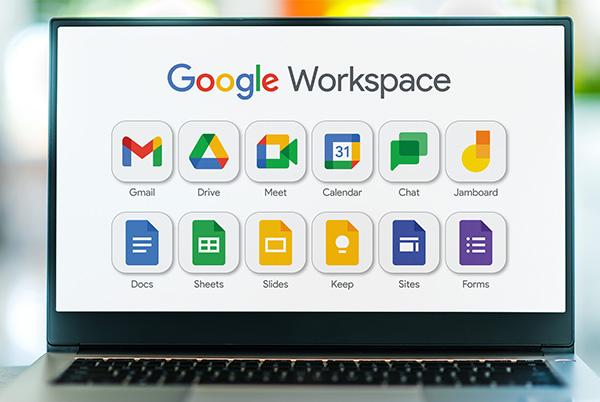 a laptop with google workspace icons on it