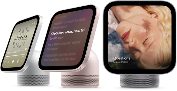 Apple HomeView, three devices all displaying Apple Music app album artwork and lyrics, from left to right, silver colour, side exterior, rose pink colour, side exterior, space grey colour, front exterior