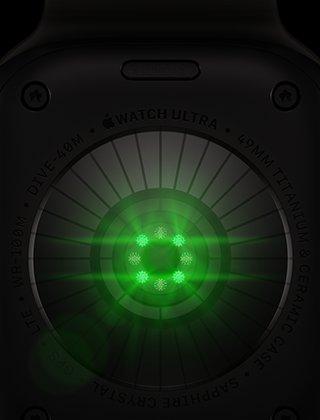 Back of Apple Watch Ultra 4, titanium case, black colour, multiple round sensors with glowing green LED lights