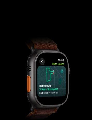 Apple Watch Ultra 4, titanium case, black colour, Race Route feature with a map of a running route, left side exterior, Action button, Alpine Loop strap, burgundy colour