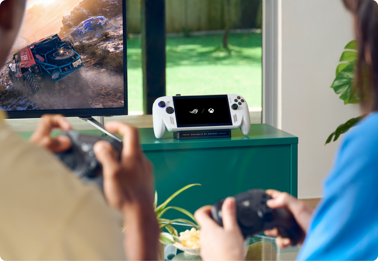 a couple of people playing a video game on a television