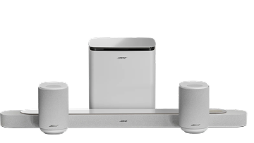 Two white speakers, a white subwoofer and a soundbar