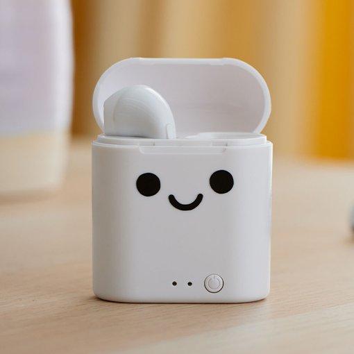 An earbud case with a face printed on it