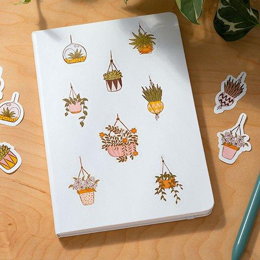 A notebook with stickers on it