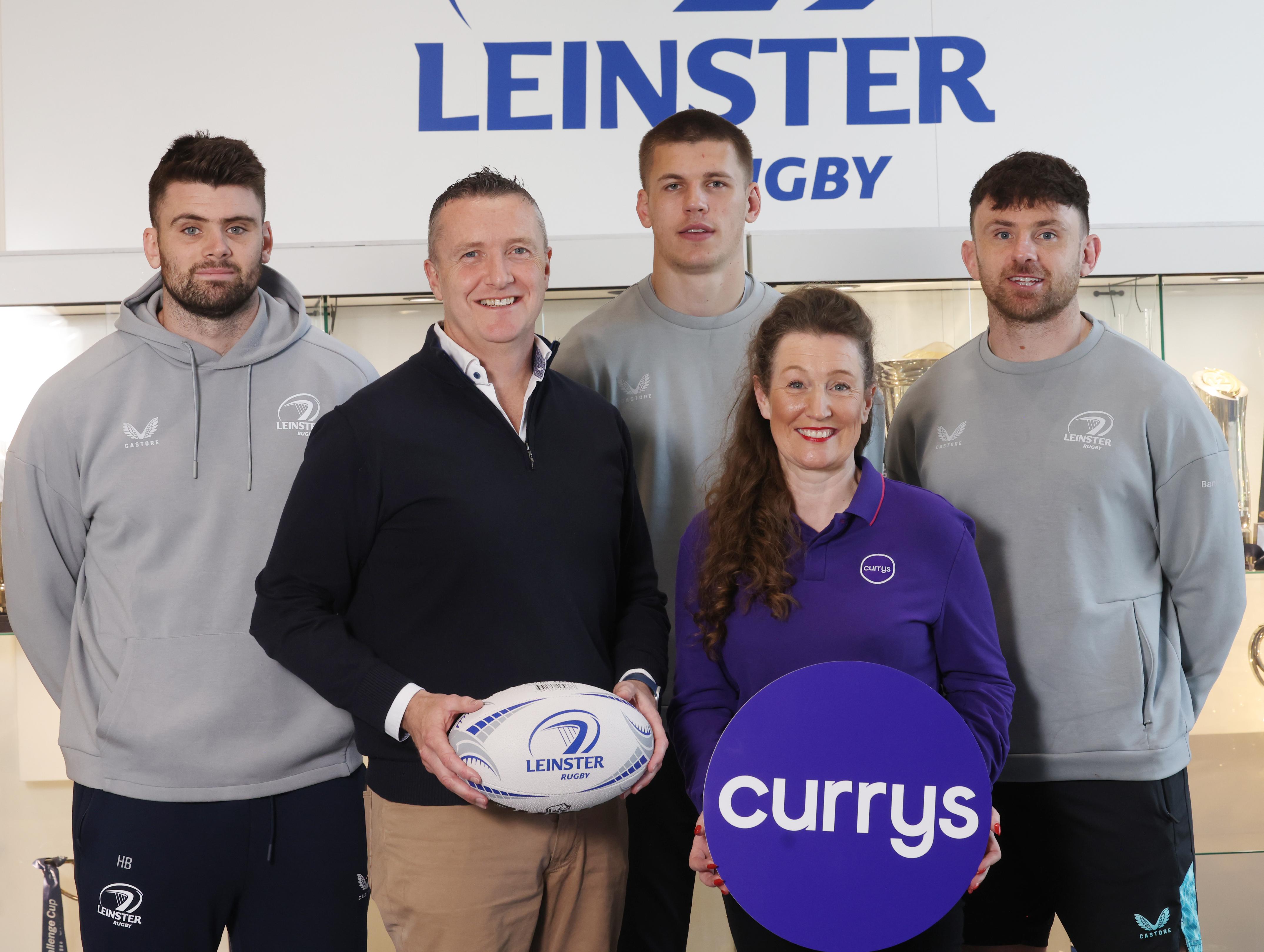 Leinster Rugby players Hugo Keenan, Sam Prendergast and Harry Byrne joined Annie Manley, General Manager at Currys Carrickmines and Eamon de Búrca, Head of Commercial Partnerships at Leinster Rugby 