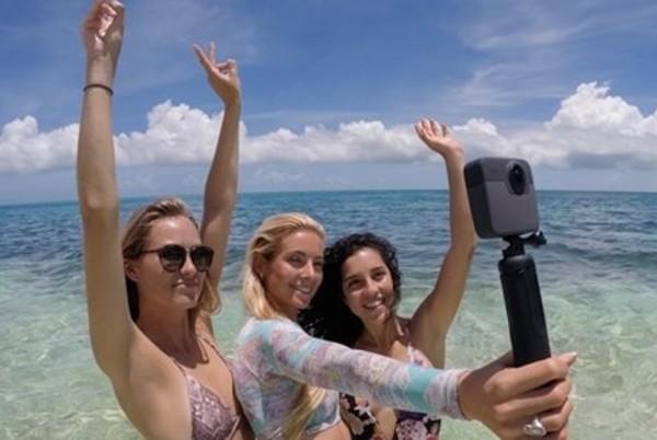 girls taking photos
