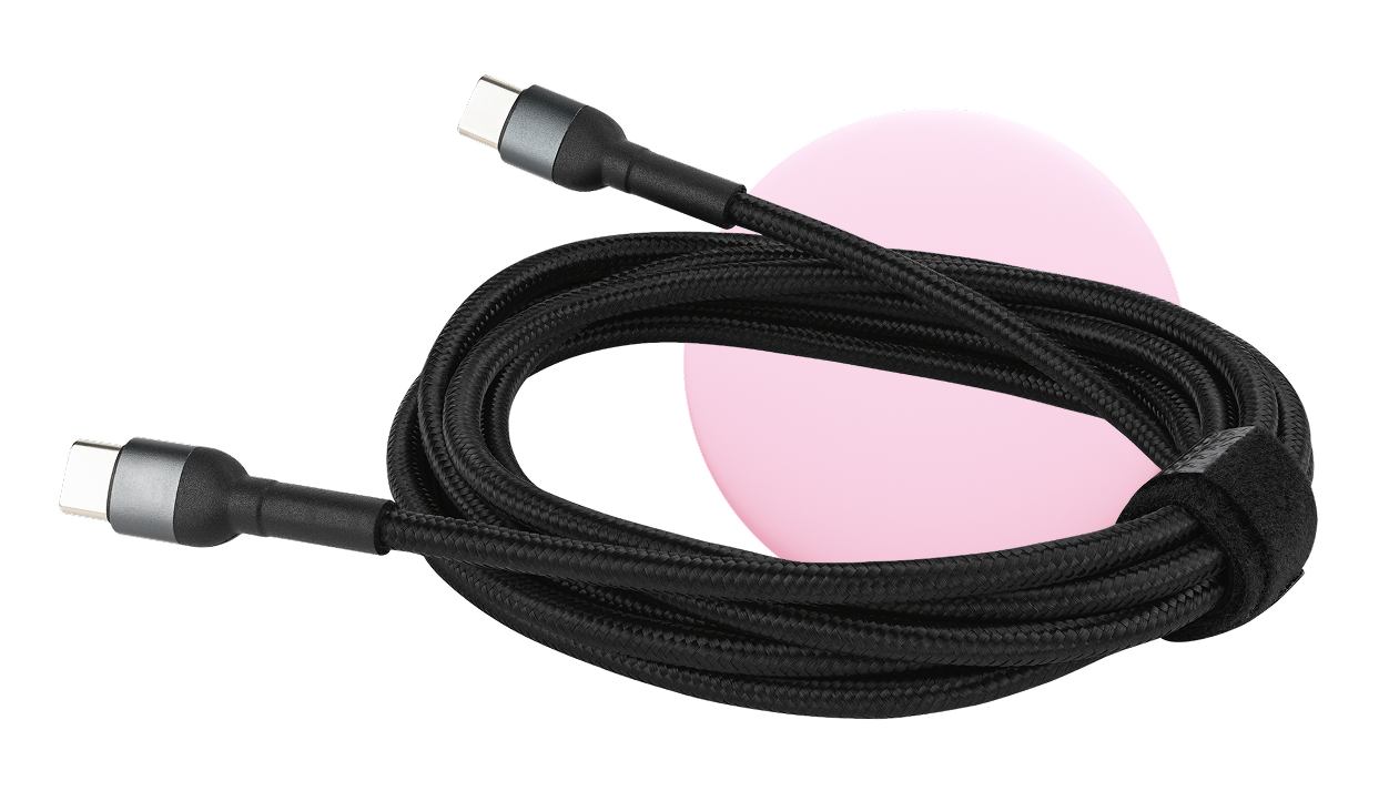 A USB-C to USB-C charger cable wound in a pile
