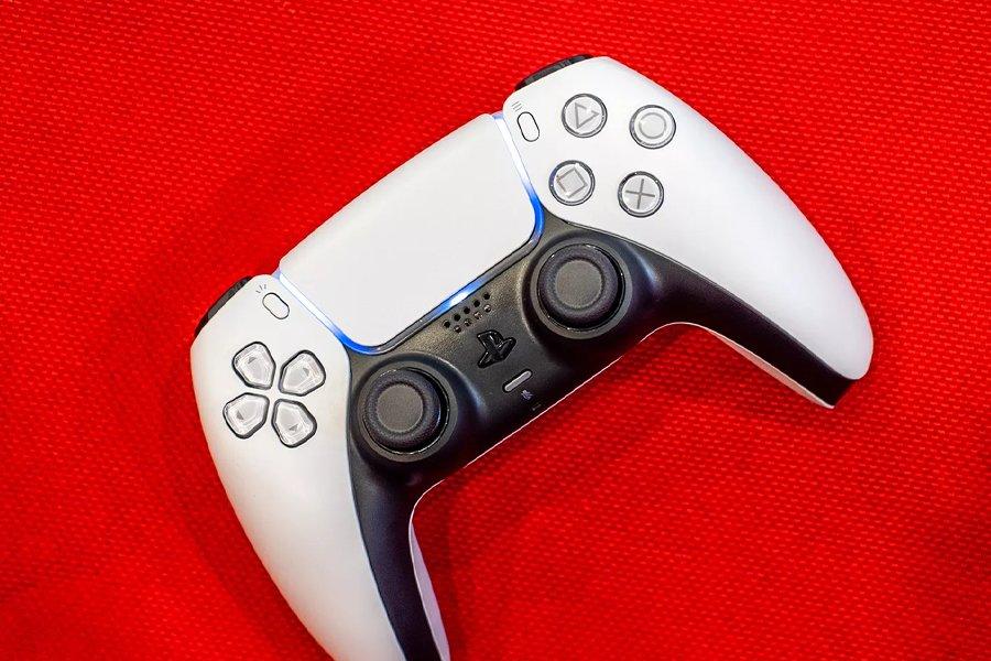 A PS controller on a red background