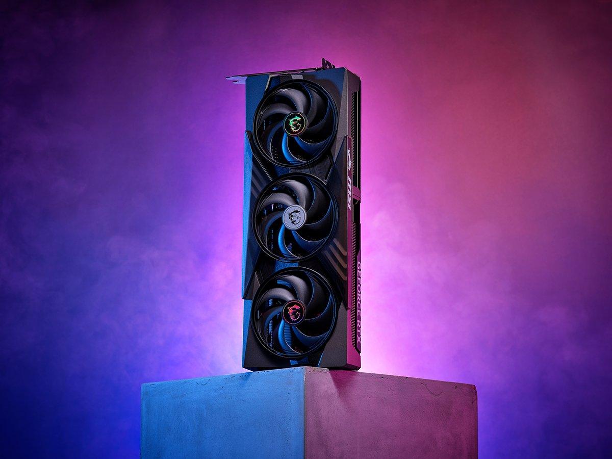 A graphics card sitting on top of a concrete block surrounded by a purple glow