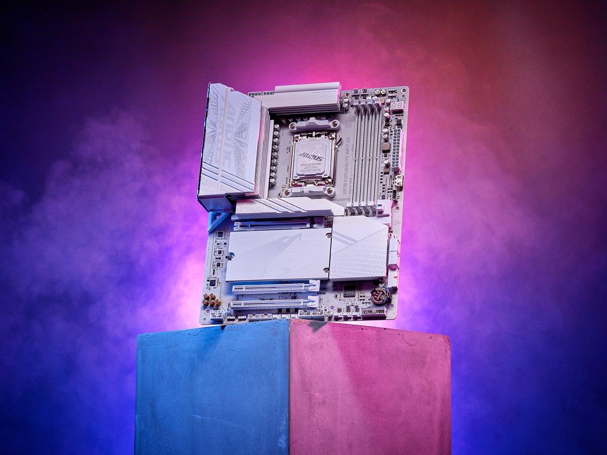 A motherboard sitting on top of a concrete block surrounded by a purple glow