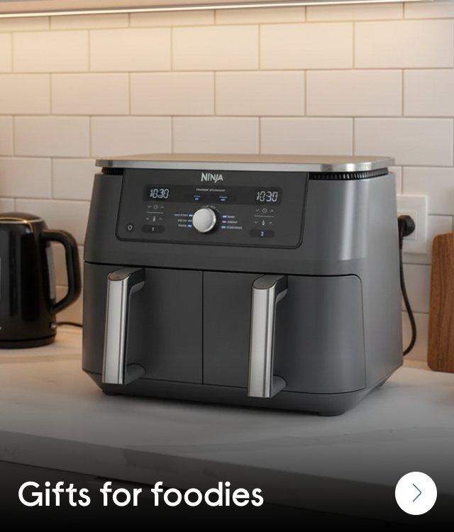 A Ninja air fryer on a kitchen counter